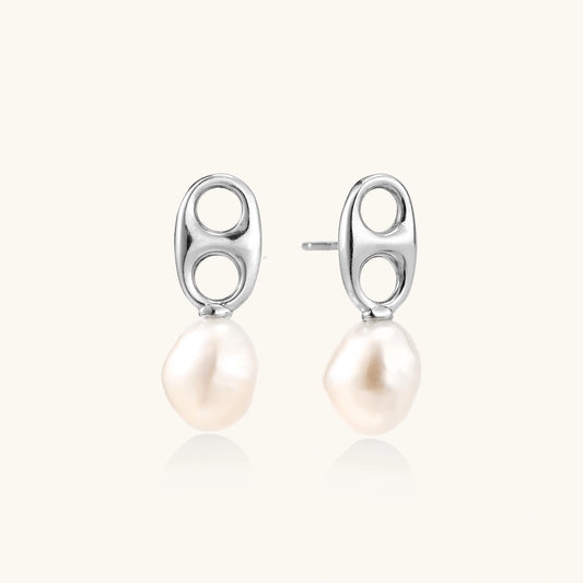 Modern rhodium-plated silver earrings with geometric double-circle design and freshwater pearl drops