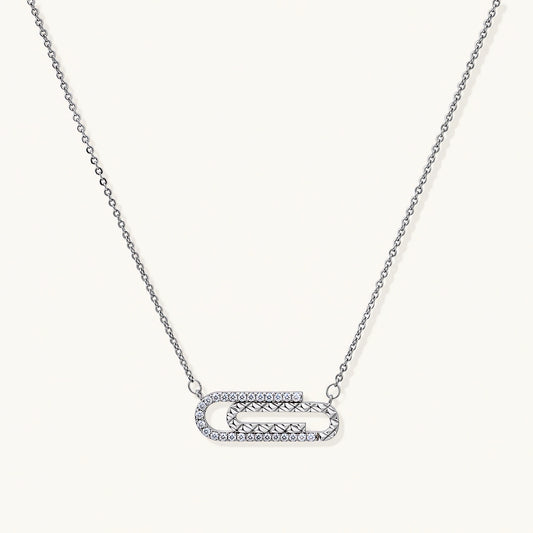 White gold plated necklace with dual-frame geometric pendant featuring crystal pavé border on pale background.